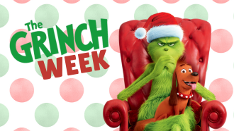 The Grinch in a Red Chair with a brown dog